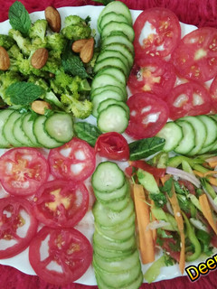 A picture of Healthy Broccoli almond salad and kachumber Salad.