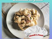 Una foto de ensalada de coditos con jamon