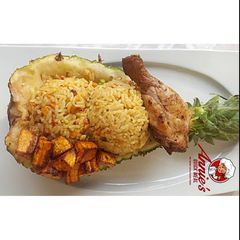 A picture of Coconut rice,fried plantain and chicken.