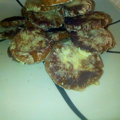 A picture of Ginger bread crinkle cookies.