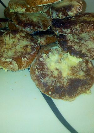 A picture of Ginger bread crinkle cookies.