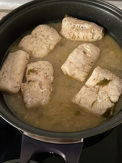 Una foto de Merluza en salsa verde
