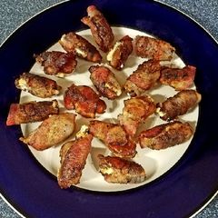A picture of Cherry Smoked Bacon Wrapped Feta Stuffed Balsamic Dates.