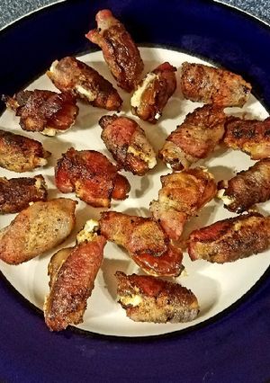 A picture of Cherry Smoked Bacon Wrapped Feta Stuffed Balsamic Dates.