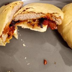 A picture of Sausage patties in pastry.