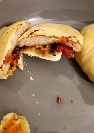 A picture of Sausage patties in pastry.
