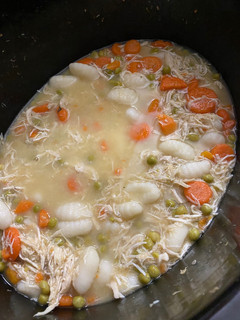A picture of Slow Cooked Chicken and Gnocchi Dumplings.