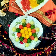 A picture of Rangberange ladoo coconut malai ladoo.