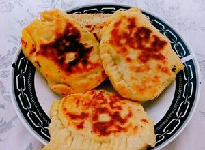 Una foto de Empanadas de harina de trigo asadas rellenas de vegetales
