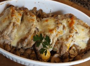 Foto principal de Libritos de carne de cerdo rellenos con salsa de champiñones al vino