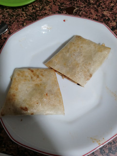 Una foto de Burrito de pollo mechado