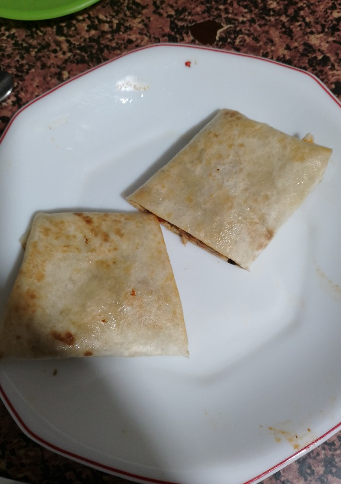 Una foto de Burrito de pollo mechado