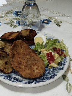 Una foto de Milanesa de Pollo al Horno