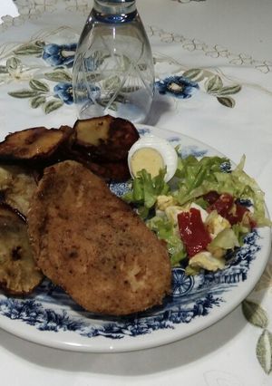 Una foto de Milanesa de Pollo al Horno