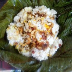 A picture of Mutton biriyani in vazhayila kizhi.