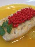 Lomos de merluza en salsa con perlas de arenque