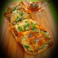 A picture of Cheesy masala pav toasty Open pav sandwich.