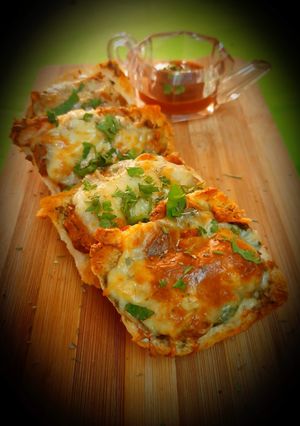 A picture of Cheesy masala pav toasty Open pav sandwich.