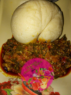 A picture of Tuwon couscous with sesame and green soup.