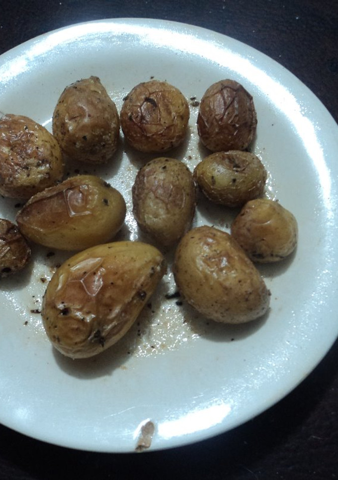 Una foto de Papas al horno con orégano, sal y tequila