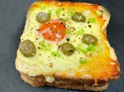 A picture of egg and ketchup sandwich