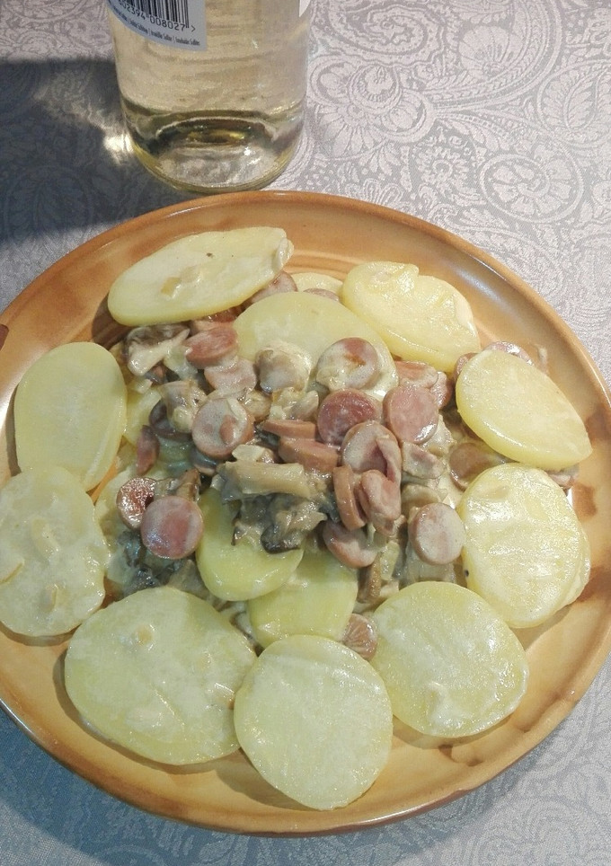 Una foto de Salchichas con setas cardo