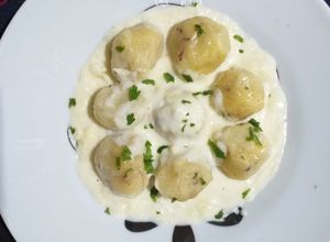 Foto de Nhoque de batata com carne seca e molho de queijo coalho