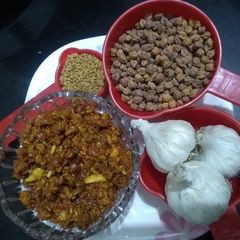 A picture of Chana Methi Lahsan ka Sour(khatta) Pickle(Achaar).