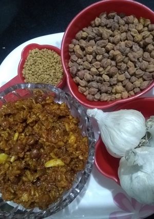 A picture of Chana Methi Lahsan ka Sour(khatta) Pickle(Achaar).