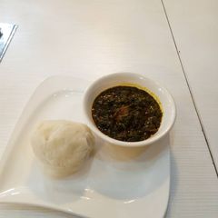 A picture of Afang Soup with fufu.