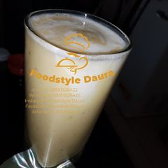 A picture of Pineapple and banana smoothie.
