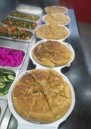 صورة لوصفة شرائح الدجاج بالفطر والكريمه وجبن الموزاريلا والفليفله الملونه