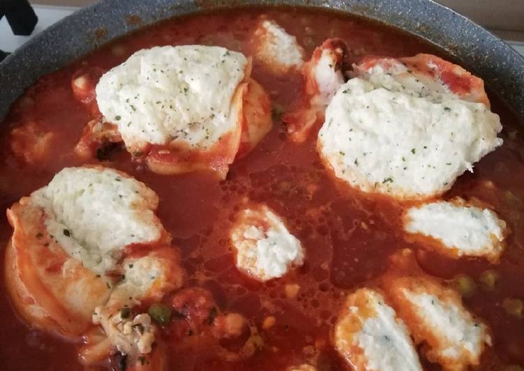 Seppie ripiene con piselli al ragù