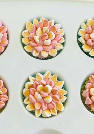 A picture of Eggless cupcakesDecorated with buttercream, fondant and marshmallows.