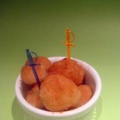A picture of Loukoumades with honey.