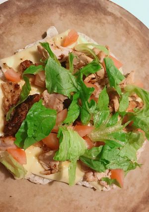 A picture of Chicken Lettuce Tomato Pizza.
