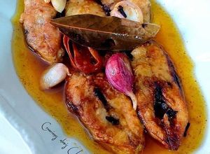 Una foto de Jureles blancos de roca en escabeche de fish masala