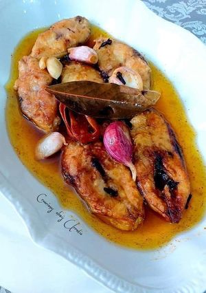 Una foto de Jureles blancos de roca en escabeche de fish masala
