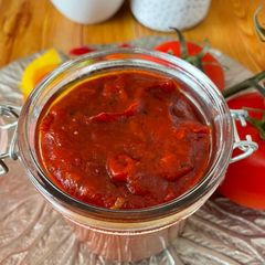 A picture of Pizza and pasta sauce.