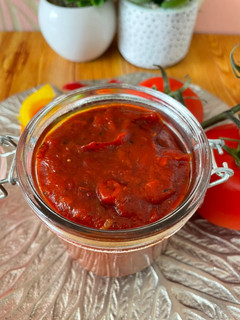 A picture of Pizza and pasta sauce.