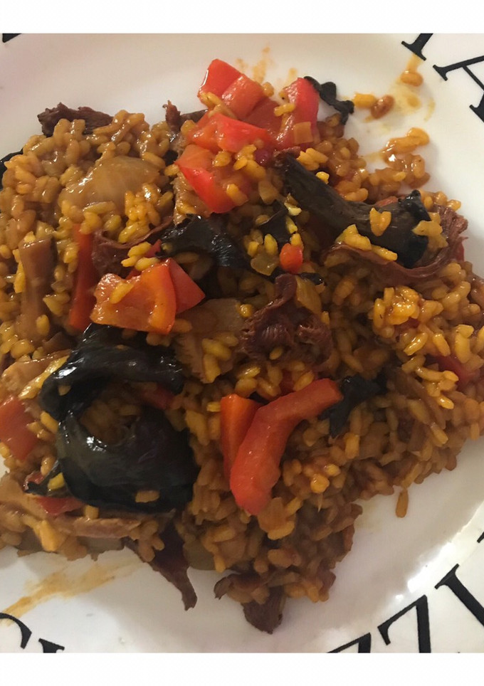 Una foto de Arroz con setas