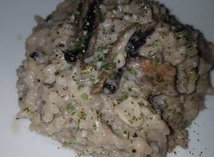 Una foto de Risotto de champiñones y Baicon