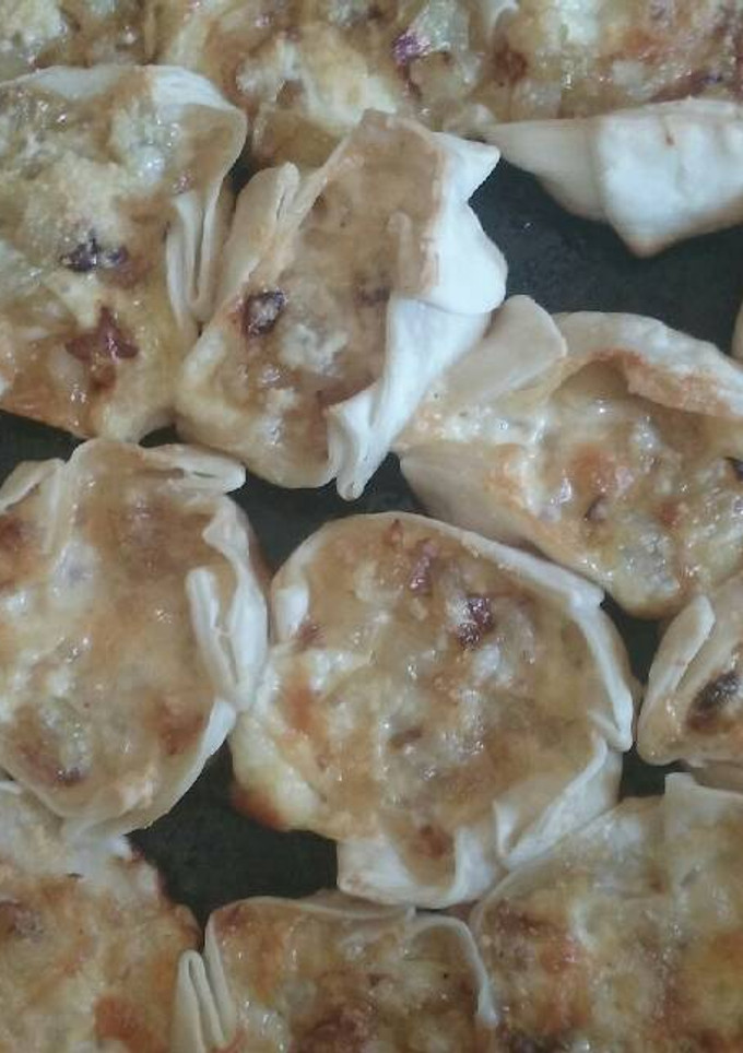 Una foto de Tartelitas de cebolla y queso