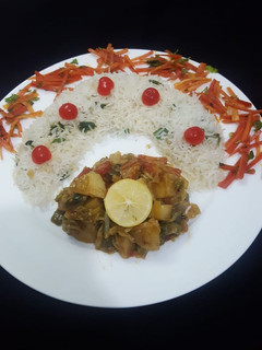 A picture of Fried veggies with garlic rice.