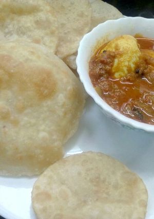A picture of Poori with Egg Roast.
