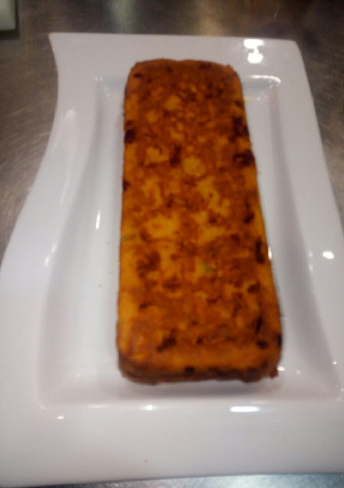 Una foto de Pastel de merluza, mahonesa picante