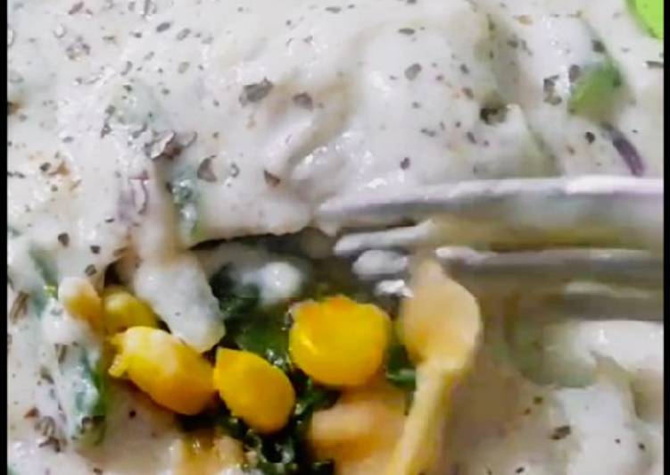 Steps to Make Homemade Spinach and Corn Whole Wheat Ravioli in White Sauce