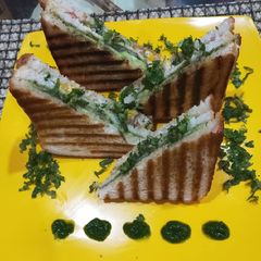 A picture of Cucumber and tomato sandwich.