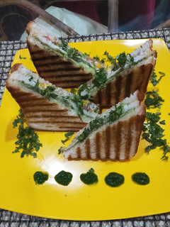 A picture of Cucumber and tomato sandwich.