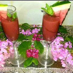 Red watermelon juice, mint and lemon juice A picture of Red watermelon juice, mint and lemon juice.
